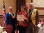 John & Katie Haley receiving Int'l President's Certificate of Appreciation 